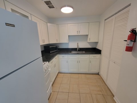 Renovated kitchen with granite countertops
