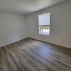 Living room with new LVT wood flooring throughout the apartment (except kitchen and bath)