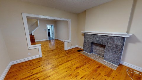 Beautiful hardwood floors in living room and dining room!  Also 3 FREE OFF STREET PARKING SPOTS!