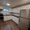 Renovated kitchen with Subway tile back splash & granite countertopsi