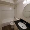 Renovated bathroom w/ new bathtub, surround and vanity with granite countertopsoom