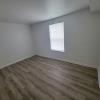 Bedroom w/ new flooring