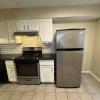 Renovated kitchen with Subway tile back splash & granite countertops