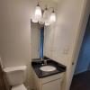 Renovated bathroom w/ new bathtub, surround and vanity with granite countertops