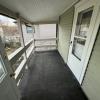 Private porch w/ view of backyard