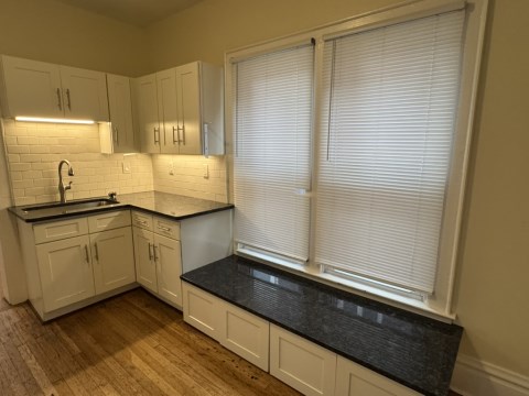 Kitchen w/ bench area for seating or storage