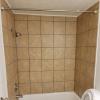 New bathtub w/ tile surround