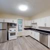 Beautiful kitchen with newer granite countertops, flooring and stainless steel appliances!