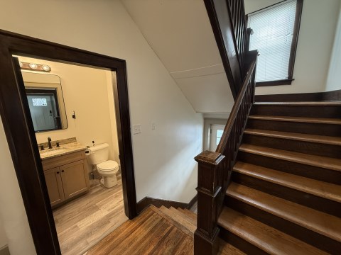 Stairs/ 1/2 bath