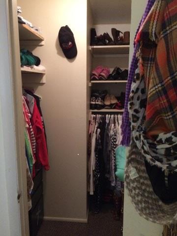 Walk in closet in bedroom