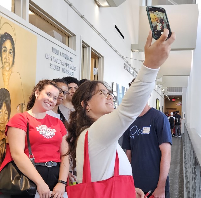 Students smiling and taking a selfie at Preview Day.