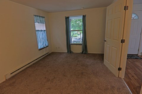05-1st Floor Bedroom 1 With View of Front Door