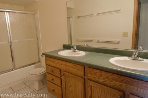 Upstairs bathroom with two sinks!