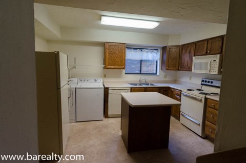 Kitchen with washer & dryer included in rent