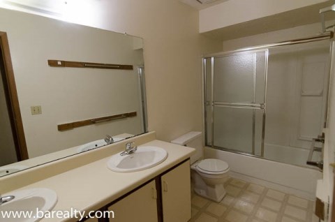 Second floor bathroom with two sinks
