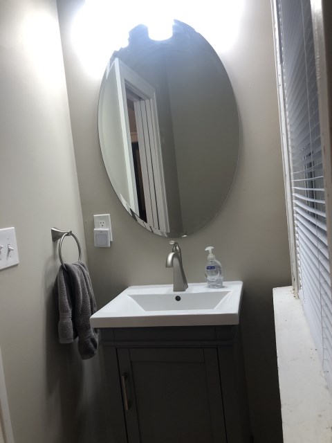 Inside of Half bath on first floor off of kitchen/dining
