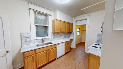Newer cabinet handles and new sink and faucet in kitchen!
