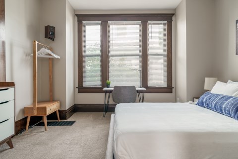 Huge amounts of natural light fill this bedroom