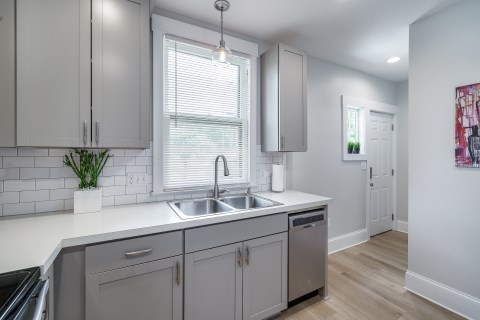 Neutral colors and contemporary design flow in the kitchen