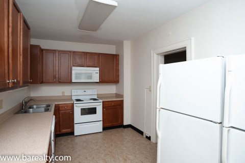 Kitchen view 2 comes with two refrigerators