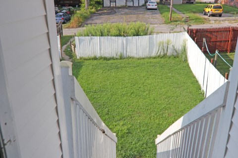 19-View Of BackYard From 2nd Floor Living Room Exit door