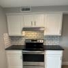 Renovated kitchen with Subway tile back splash & granite countertopsit