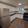 Renovated kitchen with Subway tile back splash & granite countertops