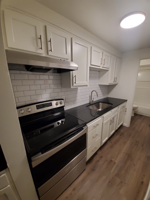 Renovated kitchen with Subway tile back splash & granite countertopshen