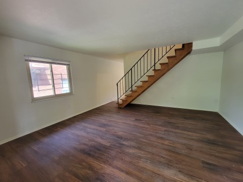 Living Room w/ new flooring & new windows
