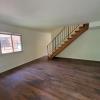 Living Room w/ new flooring & new windows