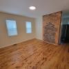 Living Room w/ new wood flooring & new windows