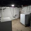 Ground level unit assigned laundry area in the basement