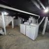 Upper level unit assigned laundry area in the basement