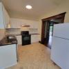 Renovated kitchen w/ granite countertops subway tile back splash
