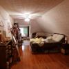View 1 of 3rd floor bedroom with added window A/C unit