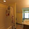 View of 3rd floor full bathroom equipped with fire escape ladder