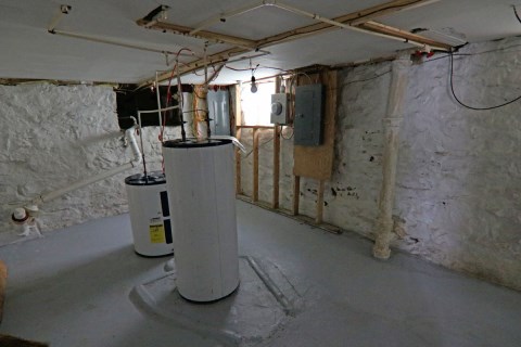 30-Basement Room 3 With Water Heaters and Fuse Boxes