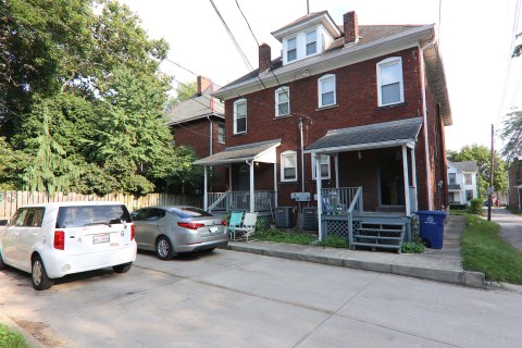 View of the the back of the rear side of house with parking lot