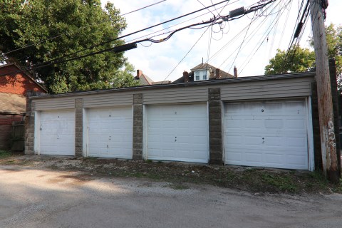 View four garages that belong to the house equipped with remote door openers