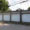 View four garages that belong to the house equipped with remote door openers