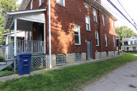 View of the side of house with side entry door