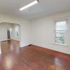 Living room with view of dining room