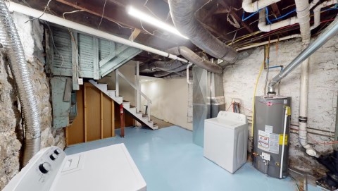 Basement with washer and dryer