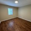 Large bedrooms w/ overhead lighting and new flooring