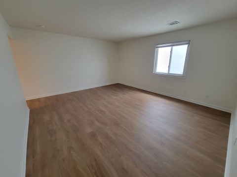 Living room w/ new flooring