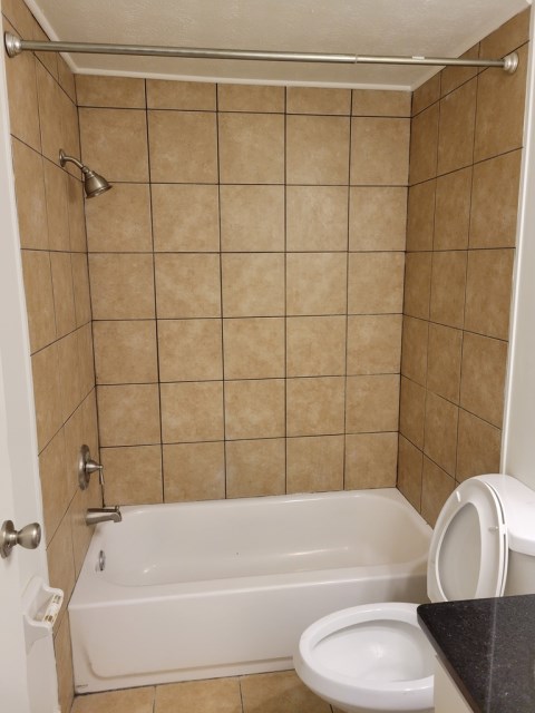 New bathtub w/ tile surround