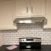 Range with stainless hood