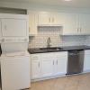 Renovated kitchen with Subway tile back splash & granite countertops