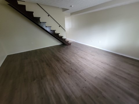 Large living room that opens to private porch