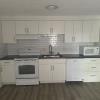 Renovated kitchen with washer/dryer